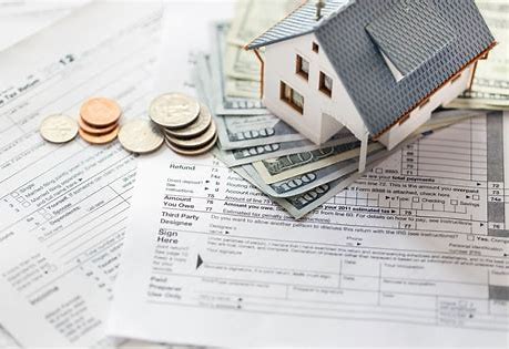Insurance And Property Taxes - Should You Add Them To Your Mortgage Payment?